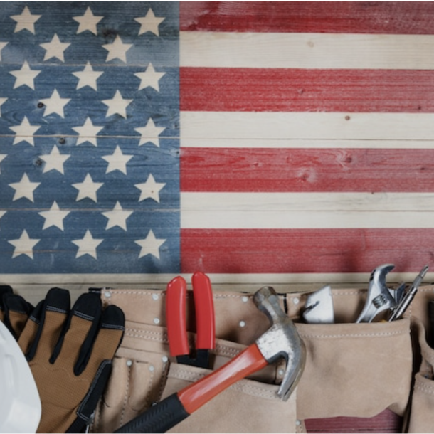 A flag with a labor worker's tools